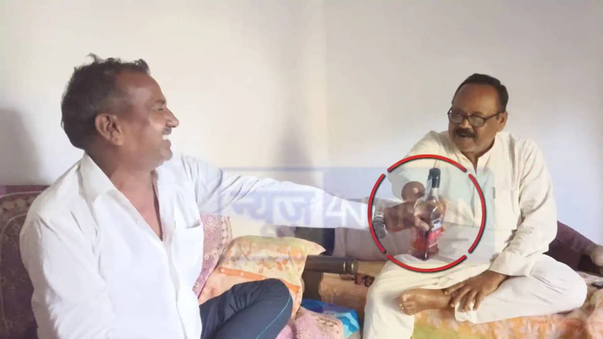 jdu state secretary viral photo with liquor bottle jdu state secretary viral photo with liquor bottle