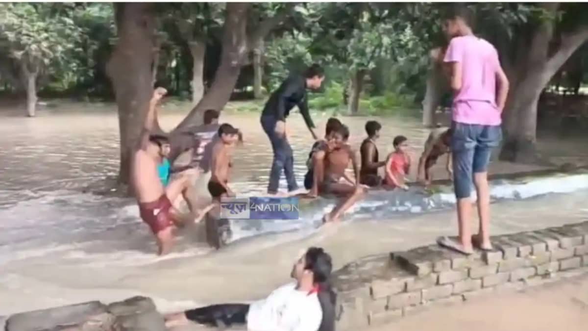 Bihar Flood Kids Turn Floodwater Into a Risky Swimming Pool Bihar Flood Kids Turn Floodwater Into a Risky Swimming Pool